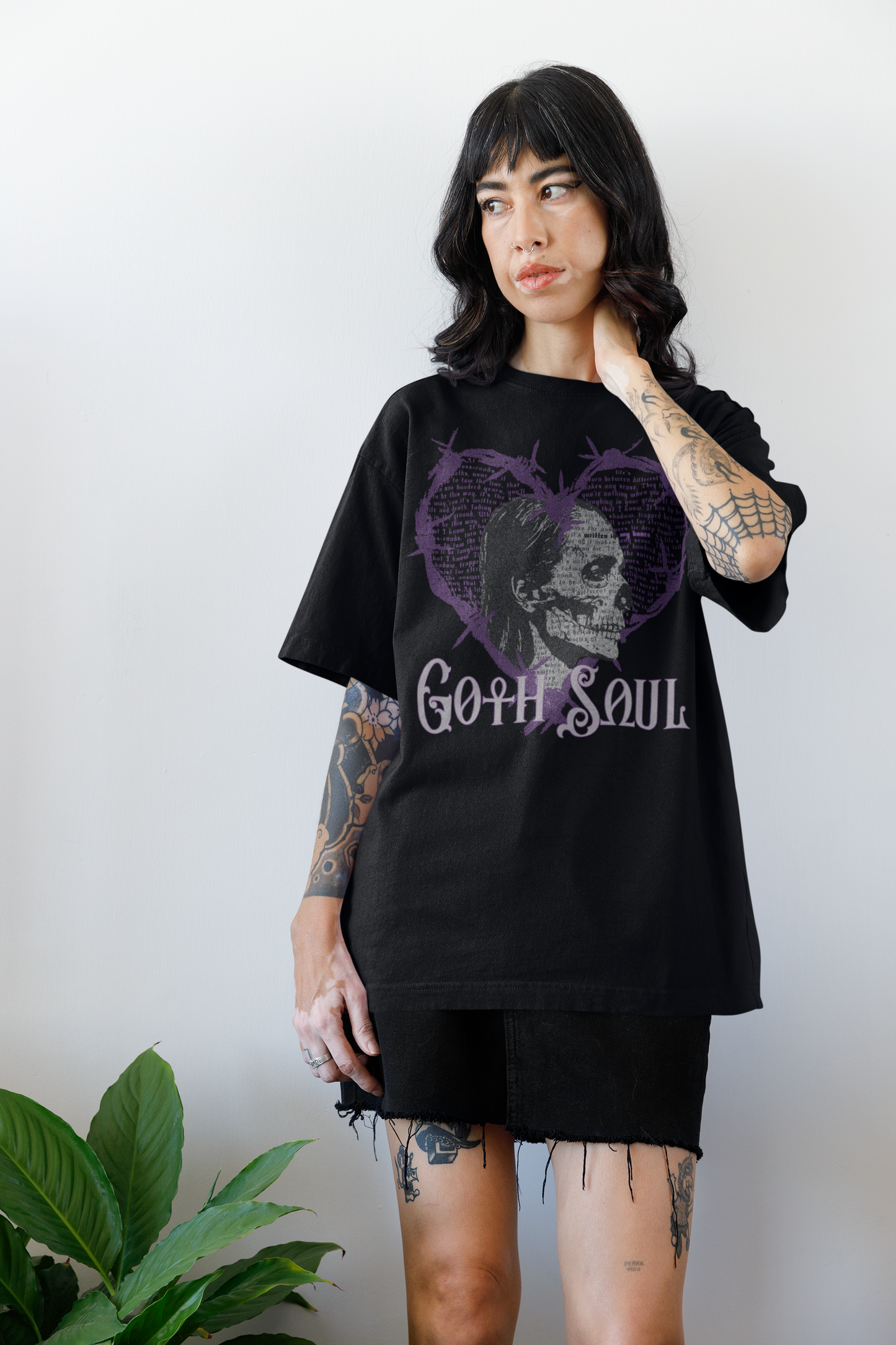 Bones Unisex Jersey Short Sleeve Tee with Purple Design (USA)